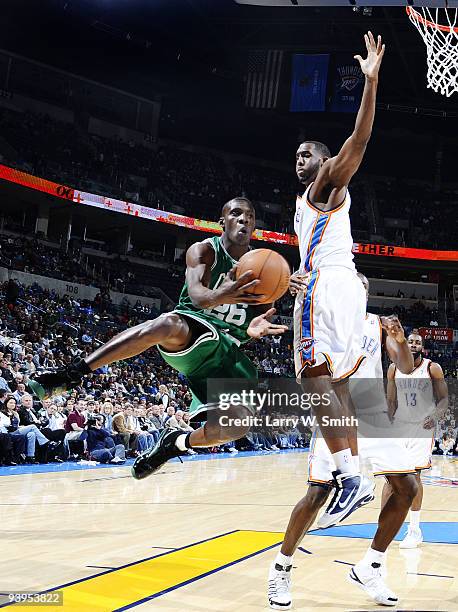 Lester Hudson of the Boston Celtics goes to the basket against D.J. White of the Oklahoma City Thunder at the Ford Center on December 4, 2009 in...