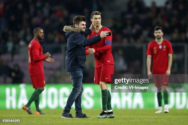 Fan makes selfie with Cristiano Ronaldo of Portugal during the International friendly match match between Portugal and The Netherlands at Stade de...