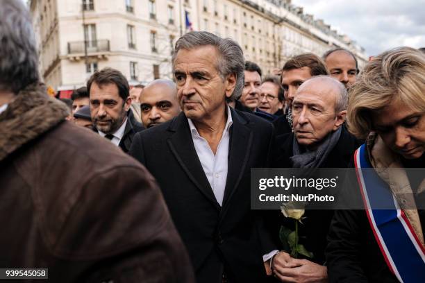 At the center Bernard-Henri Lévy a French public intellectual, media personality, and author. From left to right Christophe Castanier, the...