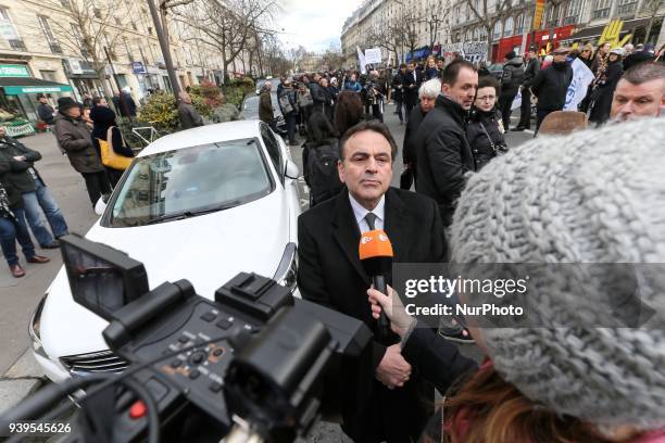 President of the Israelite Central Consistory of France Joel Mergui talks to media during a silent march in Paris on March 28 in memory of Mireille...