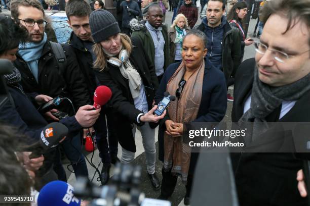 French Justice Minister Christiane Taubira talks to media during a silent march in Paris on March 28 in memory of Mireille Knoll, an 85-year-old...