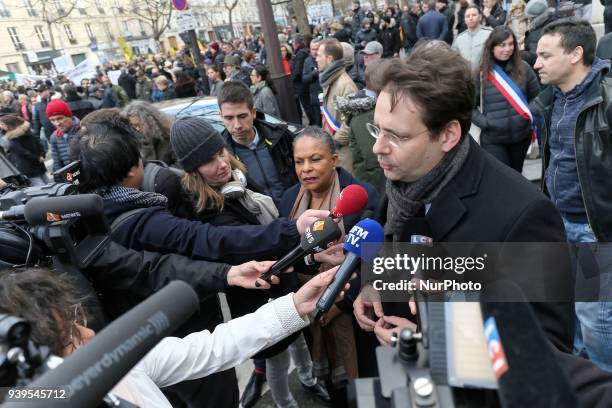 French Justice Minister Christiane Taubira talks to media during a silent march in Paris on March 28 in memory of Mireille Knoll, an 85-year-old...