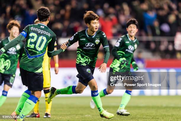 Kim Jin-Su of Jeonbuk Hyundai Motors FC celebrates after scoring his goal with teammate during the AFC Champions League 2018 Group E match between...