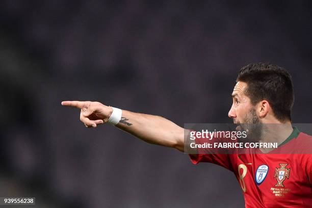 Portugal's midfielder Joao Moutinho gestures during the international friendly football match between Portugal and Netherlands at Stade de Geneve...