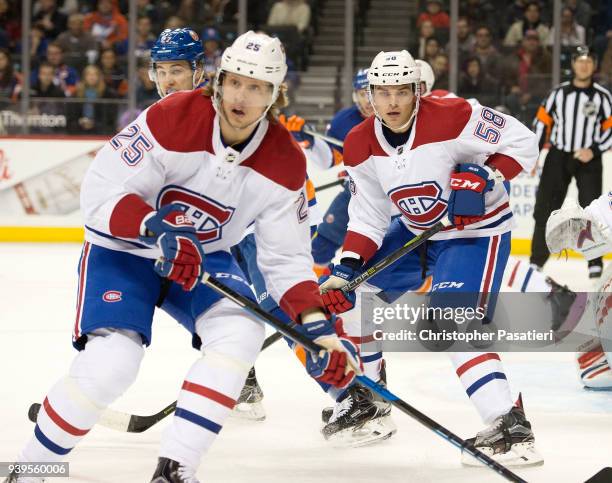 Jacob de la Rose and Noah Juulsen of the Montreal Canadiens skate during the first period against the New York Islanders at Barclays Center on March...