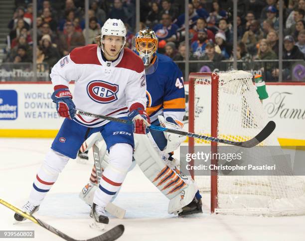Jacob de la Rose of the Montreal Canadiens obstructs the view of goaltender Jaroslav Halak of the New York Islanders during the second period at...