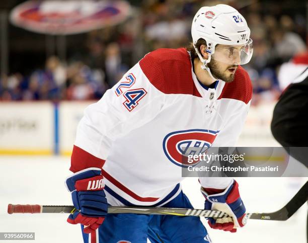 Phillip Danault of the Montreal Canadiens prepares for a face off during the second period against the New York Islanders at Barclays Center on March...