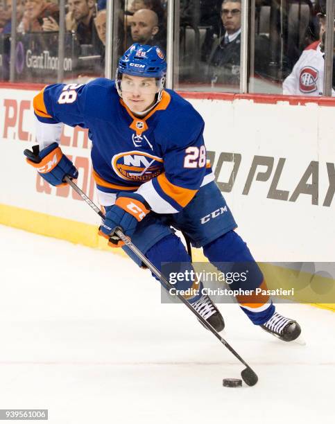Sebastian Aho of the New York Islanders skates with the puck during the second period against the Montreal Canadiens at Barclays Center on March 2,...