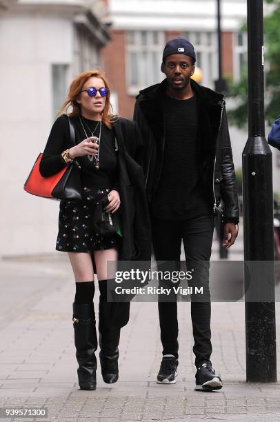 Lindsay Lohan is seen leaving her hotel to go for a walk around Mayfair on June 2, 2014 in London, England.