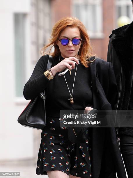Lindsay Lohan is seen leaving her hotel to go for a walk around Mayfair on June 2, 2014 in London, England.