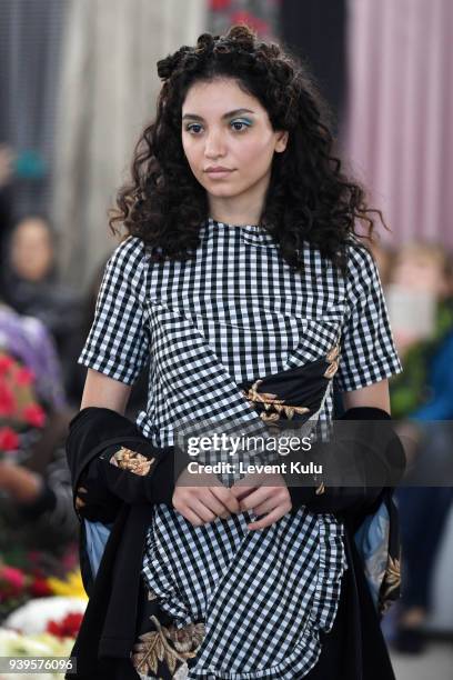 Model walks the runway at the Asli Filinta show during Mercedes Benz Fashion Week Istanbul at on March 29, 2018 in Istanbul, Turkey.