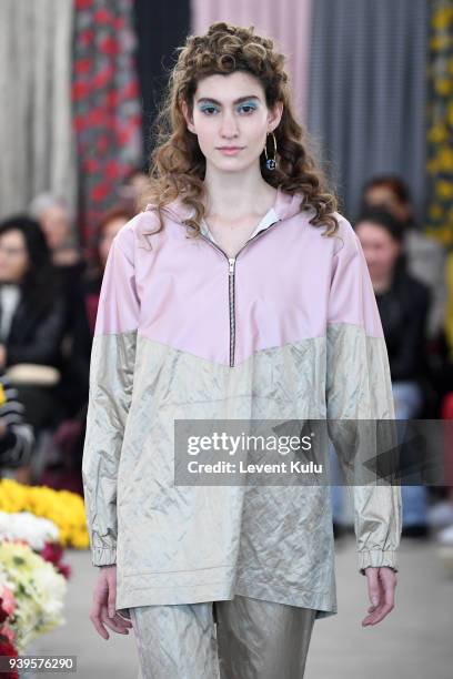 Model walks the runway at the Asli Filinta show during Mercedes Benz Fashion Week Istanbul at on March 29, 2018 in Istanbul, Turkey.