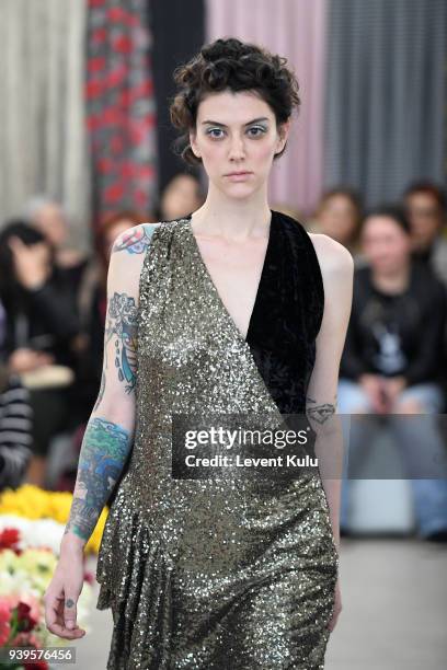 Model walks the runway at the Asli Filinta show during Mercedes Benz Fashion Week Istanbul at on March 29, 2018 in Istanbul, Turkey.