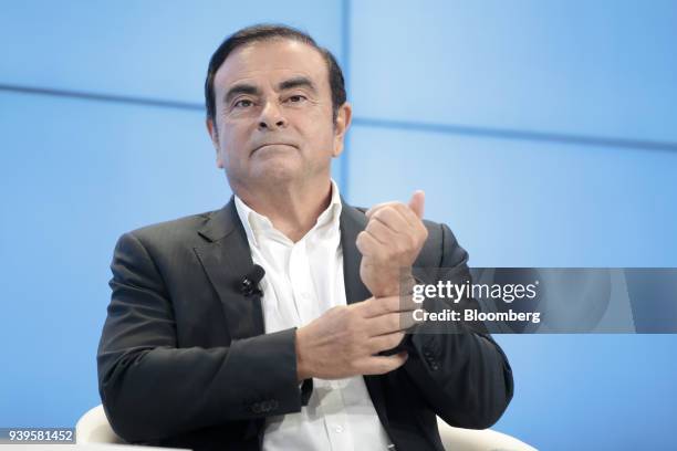 Carlos Ghosn, chairman of the alliance between Renault SA, Nissan Motor Co. And Mitsubishi Motors Corp., looks on during a panel session on the...