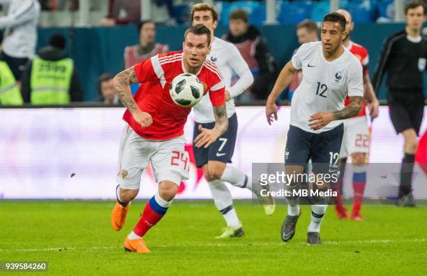 Russia's Anton Zabolotny in action during the International friendly football match at Saint Petersburg Stadium on March 27, 2018 in...