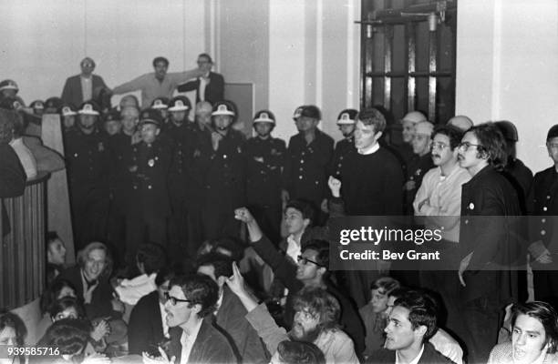 During the second takeover of Columbia University organized by the Students for a Democratic Society , police officers surround students and others...
