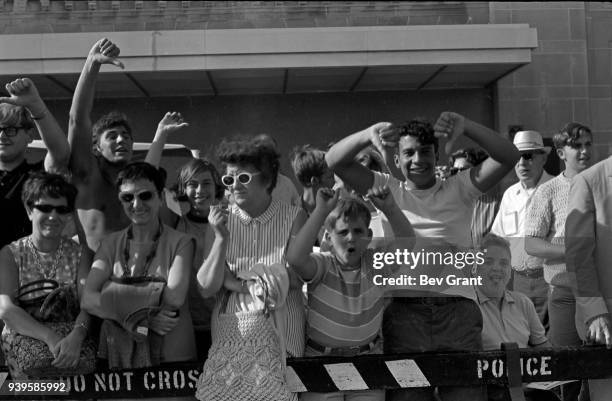 View of counter-demonstrators behind a police fence on the Atlantic City Boardwalk, during a Miss America beauty pageant protest, Atlantic City, New...