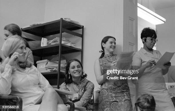At the Southern Conference Educational Fund office, members of the New York Radical Women group attend a meeting to plan a protest at the Miss...