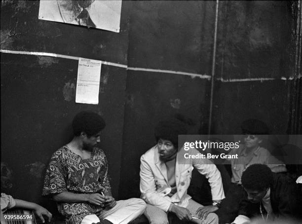 View of Black Panther Party member Don Cox and Young Lords Party members Felipe Luciano and Pablo Yoruba Guzman as they attend a Rainbow Coalition...