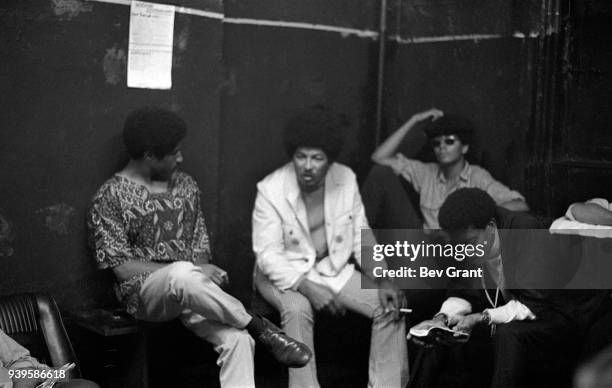 View of Black Panther Party member Don Cox and Young Lords Party members Felipe Luciano and Pablo Yoruba Guzman as they attend a Rainbow Coalition...