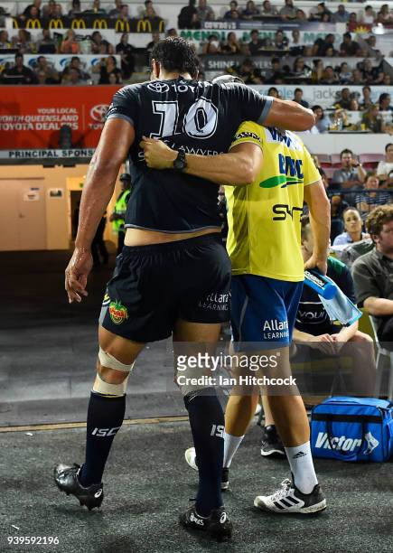 Jordan McLean of the Cowboys comes from the field after being injured during the round four NRL match between the North Queensland Cowboys and the...