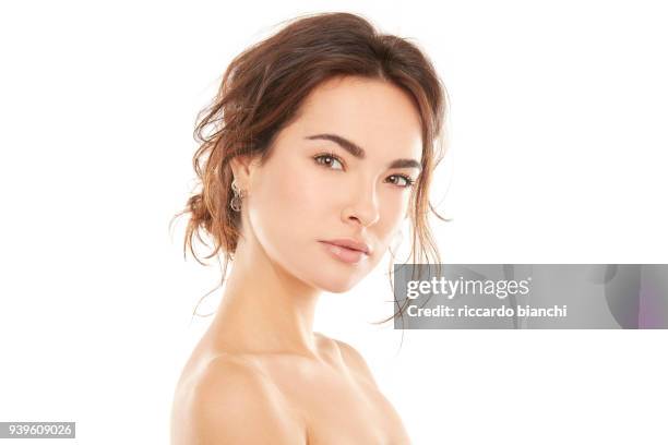 portrait of beautiful brunette woman with clean face and little smile - smile woman child stockfoto's en -beelden