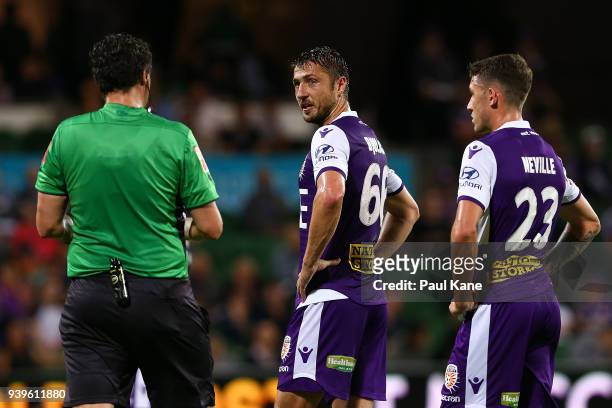 Dino Djulbic of the Glory looks to Referee Kris Griffiths-Jones after being issued a yellow card during the round 25 A-League match between the Perth...
