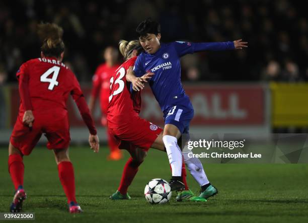 So-Yun Ji of Chelsea battles with Linda Sembrant of Montpellier during the UEFA Womens Champions League Quarter-Final: Second Leg match between...