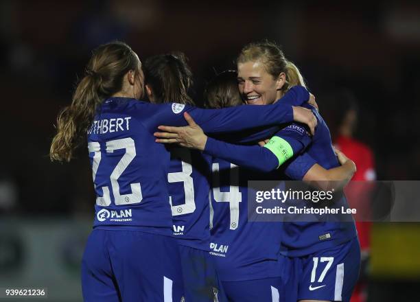 Katie Chapman of Chelsea hugs Fran Kirby and team mates after Kirby scores their third goal during the UEFA Womens Champions League Quarter-Final:...