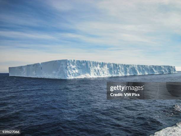 Huge tabular iceberg at the Antarctic sound very close of the Weddell sea.