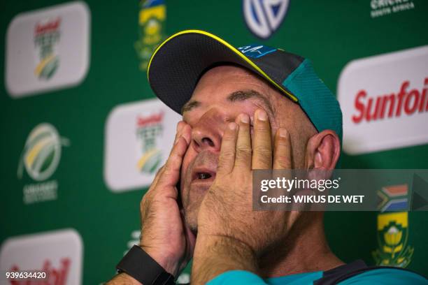 Darren Lehmann speaks to the press as he announces he will resign as Australian cricket coach after the coming Test match on March 29 in...