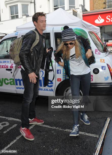 Model Cara Delevingne leaves her house on June 3, 2014 in London, England.