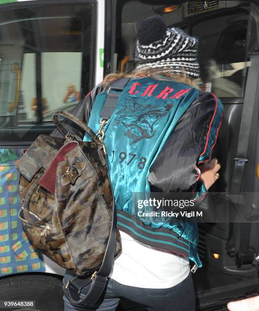 Model Cara Delevingne leaves her house on June 3, 2014 in London, England.