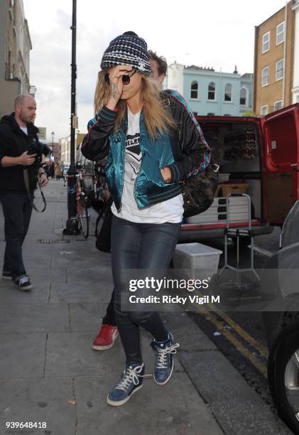 Model Cara Delevingne leaves her house on June 3, 2014 in London, England.