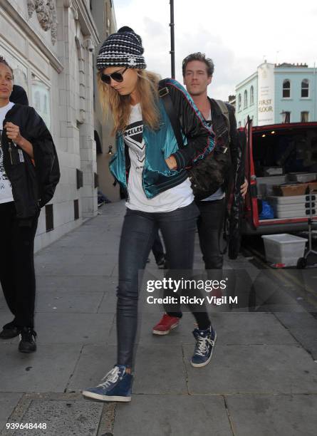 Model Cara Delevingne leaves her house on June 3, 2014 in London, England.