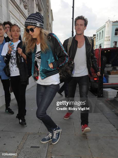 Model Cara Delevingne leaves her house on June 3, 2014 in London, England.