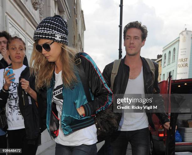 Model Cara Delevingne leaves her house on June 3, 2014 in London, England.