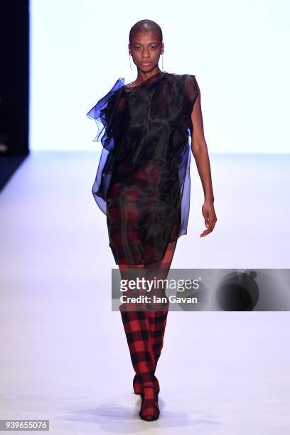 Model walks the runway at the Cigdem Akin show during Mercedes Benz Fashion Week Istanbul at Zorlu Performance Hall on March 29, 2018 in Istanbul,...