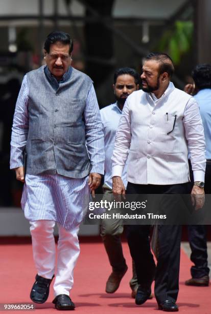 Congress Leader Prithviraj Chavan and Samajwadi Party MLA Abu Azmi during the Maharashtra State Assembly session at Vidhan Bhavan, on March 28, 2018...