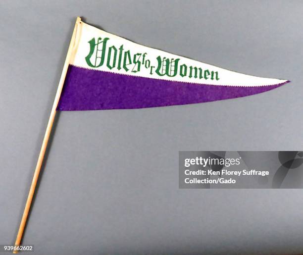 Purple, white, and green, suffrage pennant or banner, with the message "Votes for Women, " produced for the American market, with a color scheme...