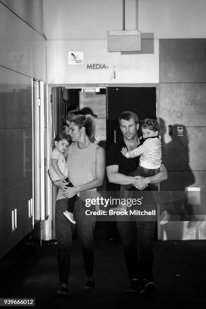 Australian Test cricketer David Warner, his wife Candice and young children arrive at Sydney International Airport on March 29, 2018 in Sydney,...