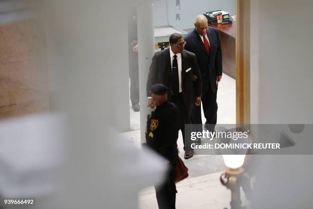 Actor and comedian Bill Cosby arrives for a pretrial hearing for his sexual assault trial at the Montgomery County Courthouse in Norristown,...