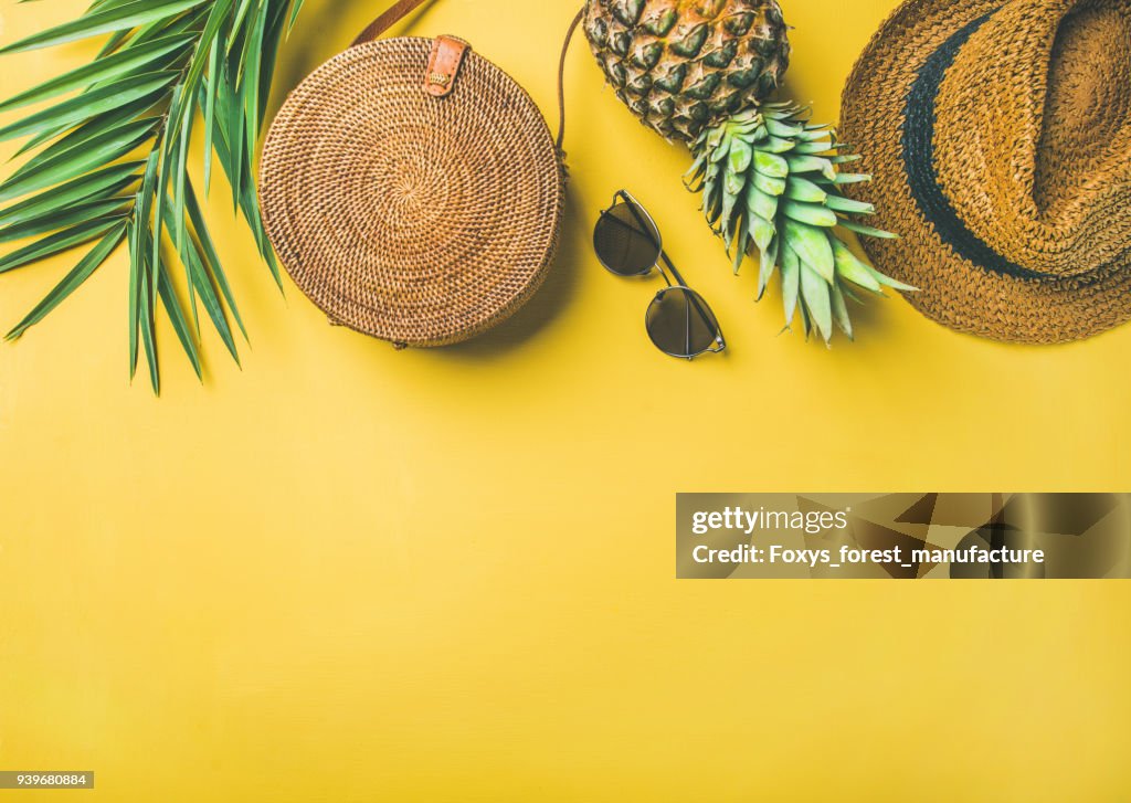 Colorful summer female fashion outfit over yellow background