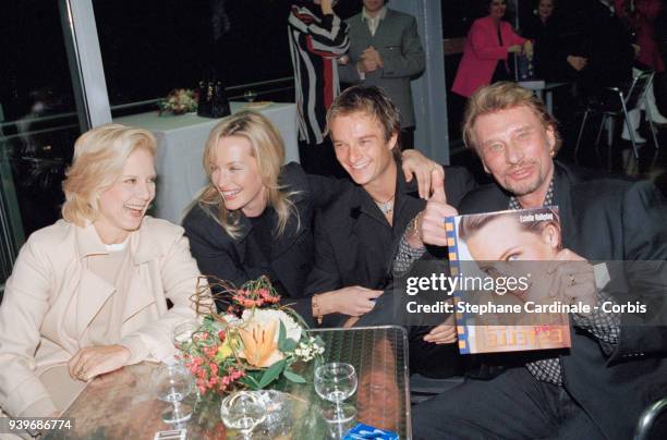 Estelle Hallyday book launch - From left to right : French singer Sylvie Vartan, Estelle Hallyday with her husband David Hallyday, french singer...