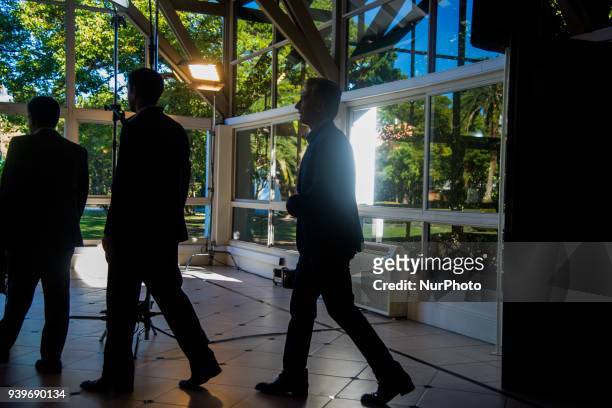 Argentina's President Mauricio Macri arrives to a press conference at Quinta de Olivos in Buenos Aires, Argentina, Wednesday, March 28, 2017. Macri...