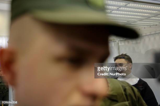 Arrested in accusation of terrorism MP Nadia Savchenko is seen in the court cage during the hearing in Kyiv, Ukraine, March 29, 2018. Appeal Court of...