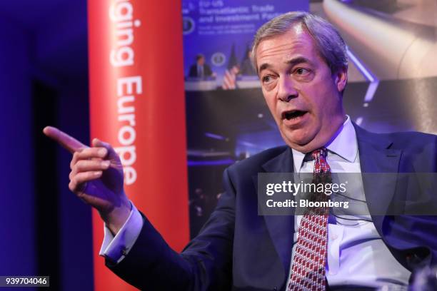 Nigel Farage, former leader of the U.K. Independence Party , gestures as he speaks during the 'UK in a changing Europe' event in London, U.K., on...