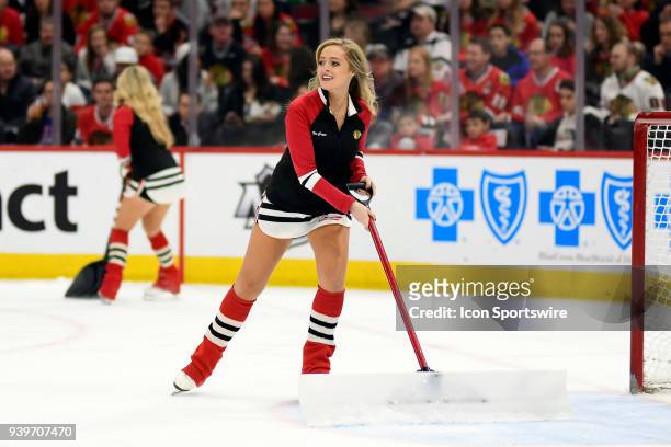 Chicago Blackhawks Ice Crew members skate the ice in action during a game between the Chicago Blackhawks and the San Jose Sharks on March 26 at the...