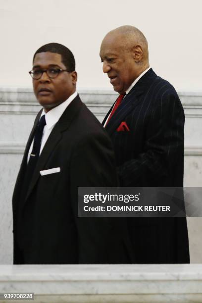 Actor and comedian Bill Cosby returns after a recess in the pretrial hearing for his sexual assault trial at the Montgomery County Courthouse in...