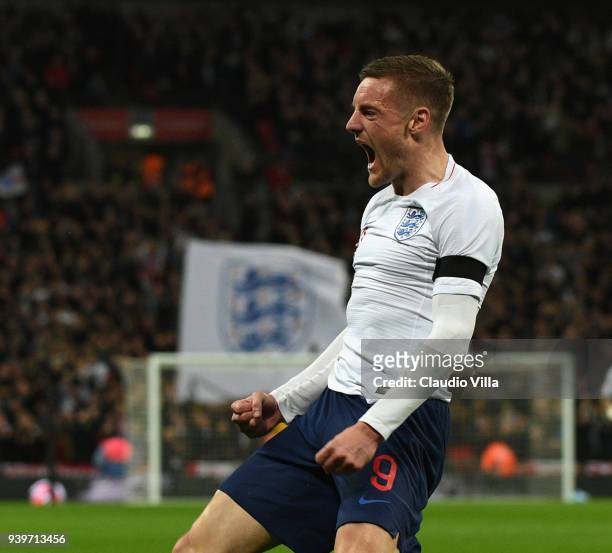 Jamie Vardy of England celebrates after scoring the opening goal during the friendly match between England and Italy at Wembley Stadium on March 27,...